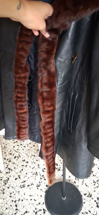 Cappotto lungo in vera pelle nero con pelliccia
