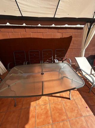 4 sillas jardín metal gris y mesa de cristal