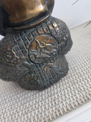 Buda sonriente de bronce