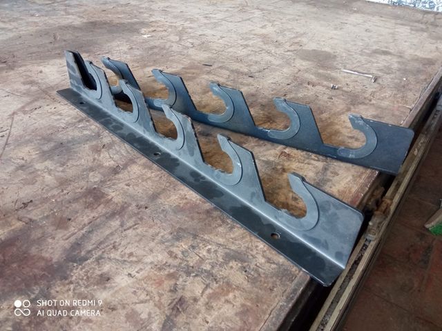 Supporto/organizer per barre olimpiche