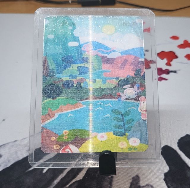 Carta Mew inmersivo lenticular