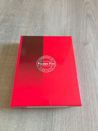 Cartera de piel. camuflaje hecha en Ubrique