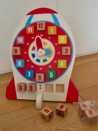Reloj educativo de madera.
