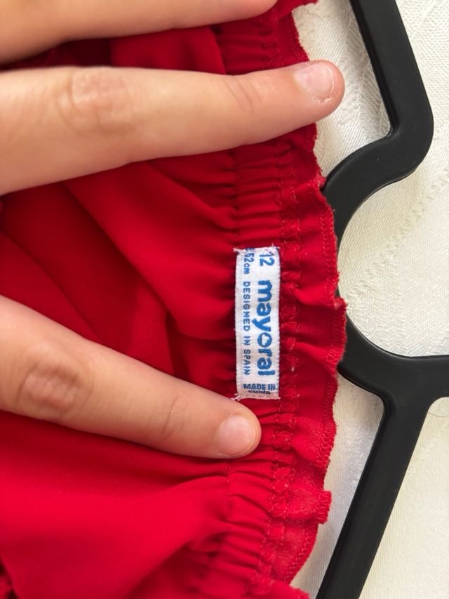 Blusa rossa scollo a barca