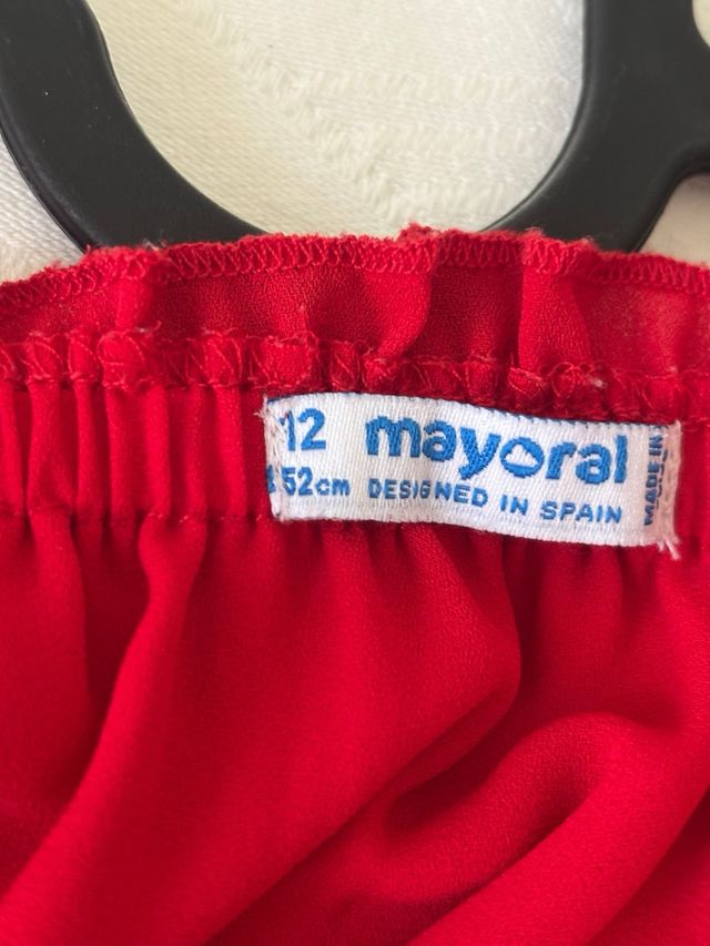 Blusa rossa scollo a barca