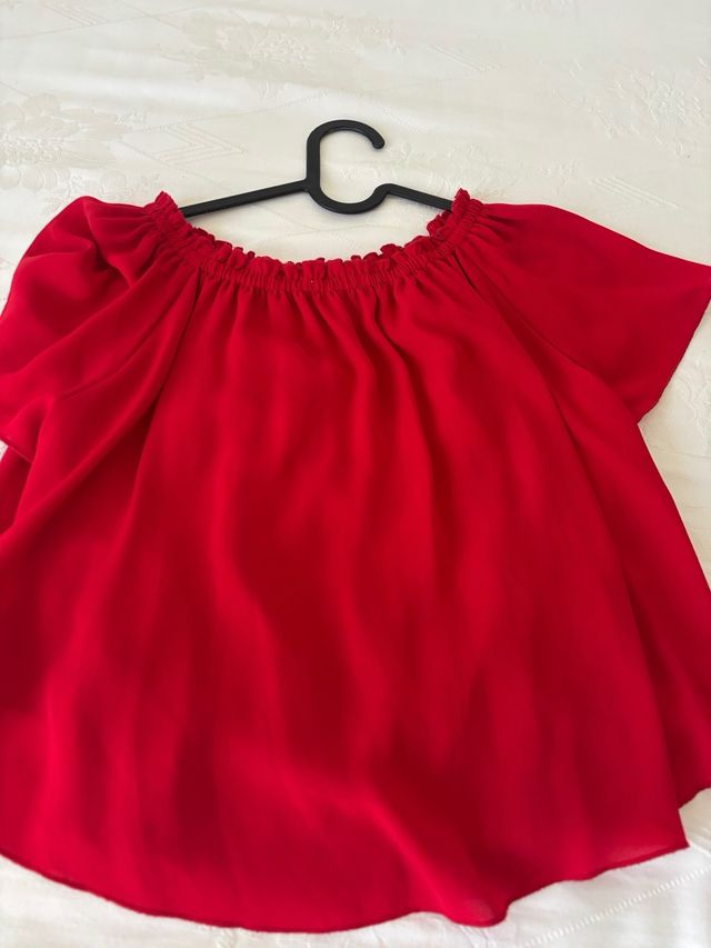 Blusa rossa scollo a barca