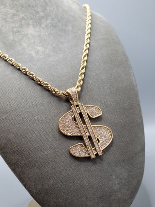 Collar con dije de dólar dorado