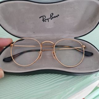 Gafas Ray-Ban redondas, doradas