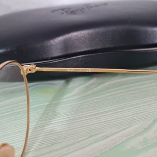Gafas Ray-Ban redondas, doradas