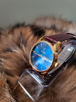 Reloj Glenfiddich azul y dorado