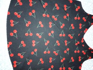 Blusa ciliegie nera con fiocco