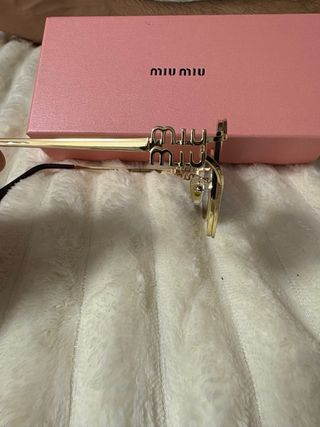 Gafas Miu Miu - Doradas
