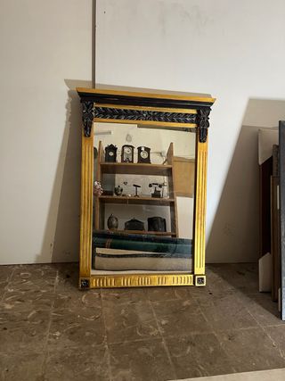 Espejo dorado y negro antiguo