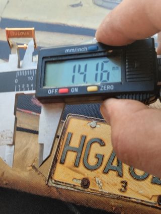 Hebilla reloj Bulova dorada