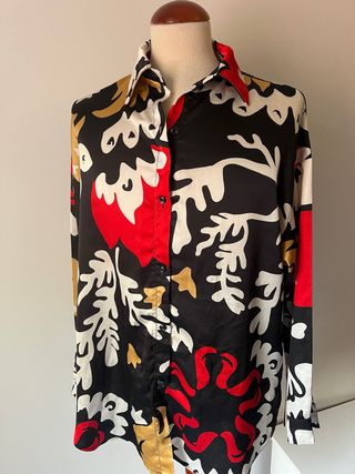 Blusa amplia