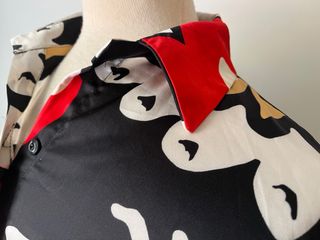 Blusa amplia