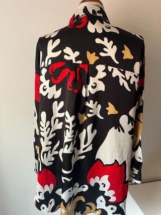 Blusa amplia