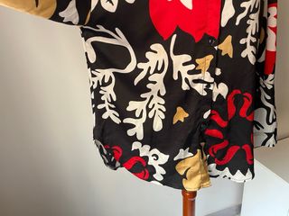 Blusa amplia