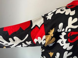 Blusa amplia