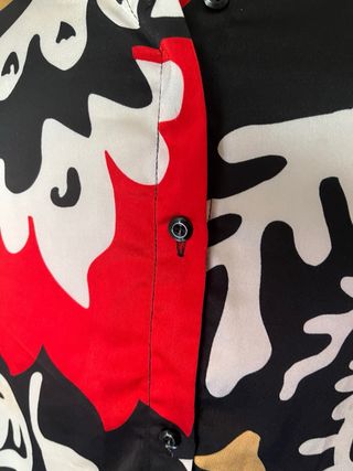Blusa amplia