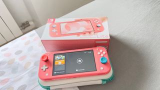 Nintendo Switch Lite Coral - Juego