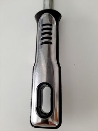 Mestolo forato in metallo