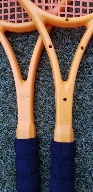 2 Raquetas  nuevas bádminton amarillas.