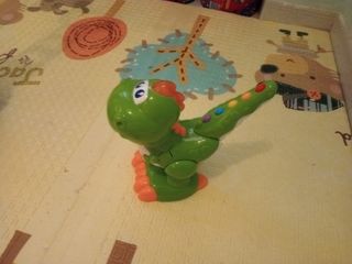 Dino musical juguete infantil