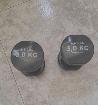 Par de mancuernas de pesas de hierro engomados 