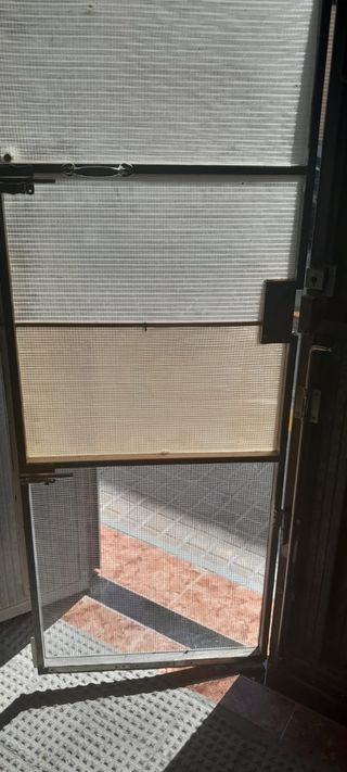 Puerta metal doble hoja antigua