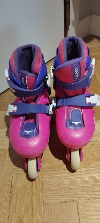Patines Oxelo Decathlon rosas y bolsa