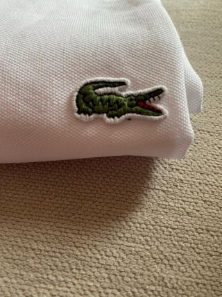 Polo Lacoste blanco