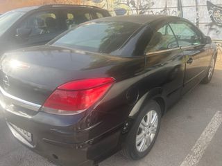 Opel Astra Twintop leer .