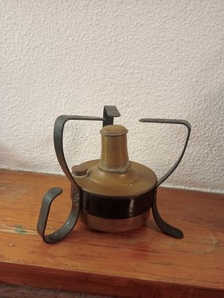 Antigua cocina de camping metal
Tiene casi 100 año