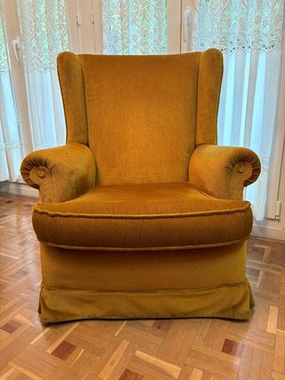Sillón orejero vintage dorado