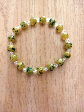 Pulsera elástica verde-amarilla