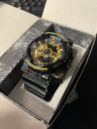 G-Shock Reloj - Negro y Dorado