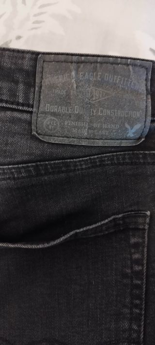 Vaqueros American Eagle negros unisex
