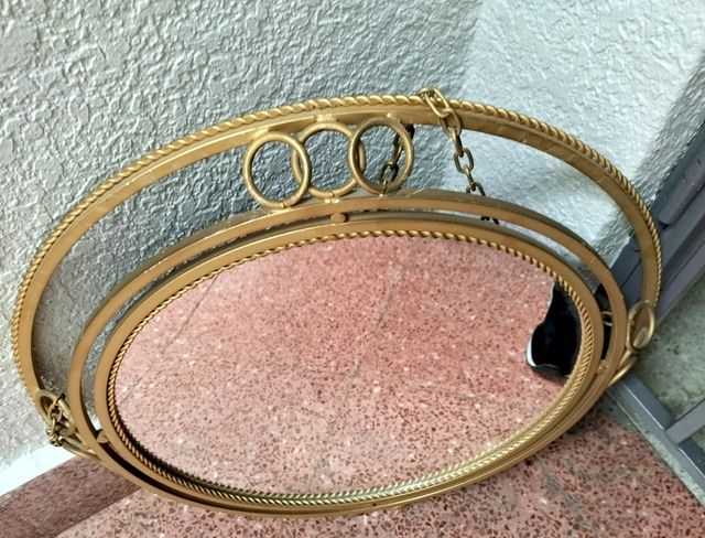 Espejo dorado redondo