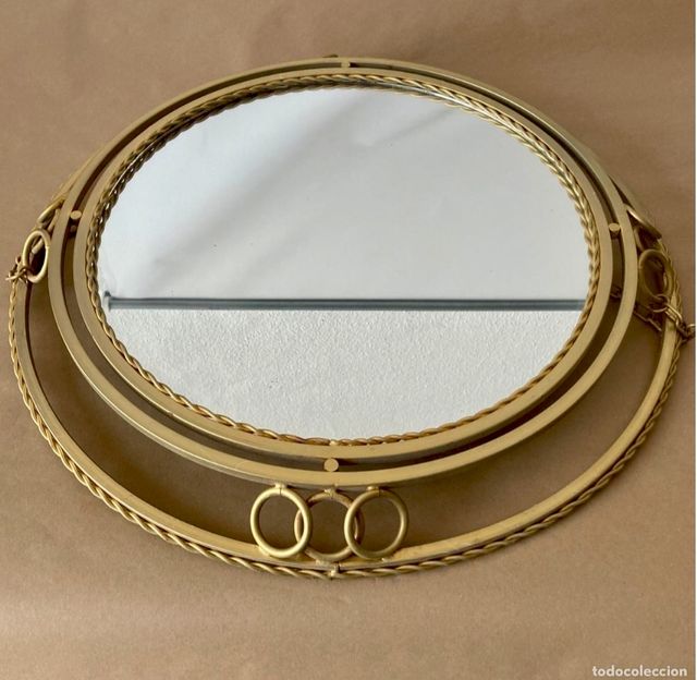 Espejo dorado redondo