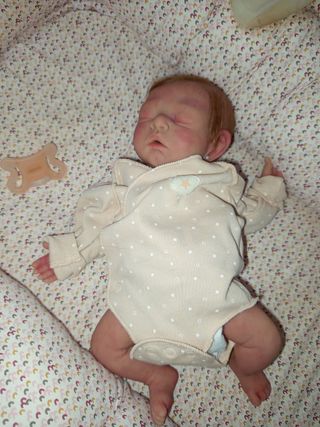 Reborn bebé silicona con sistema de pipi 