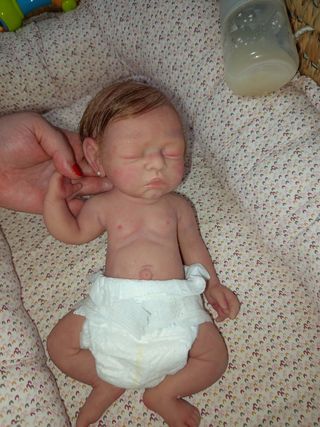 Reborn bebé silicona con sistema de pipi 