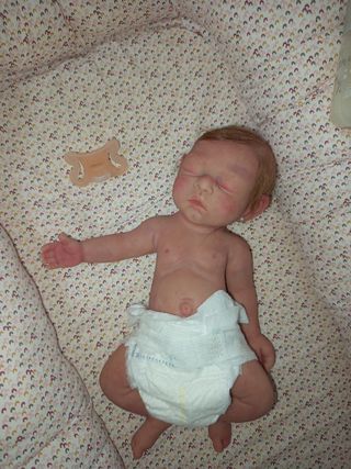 Reborn bebé silicona con sistema de pipi 