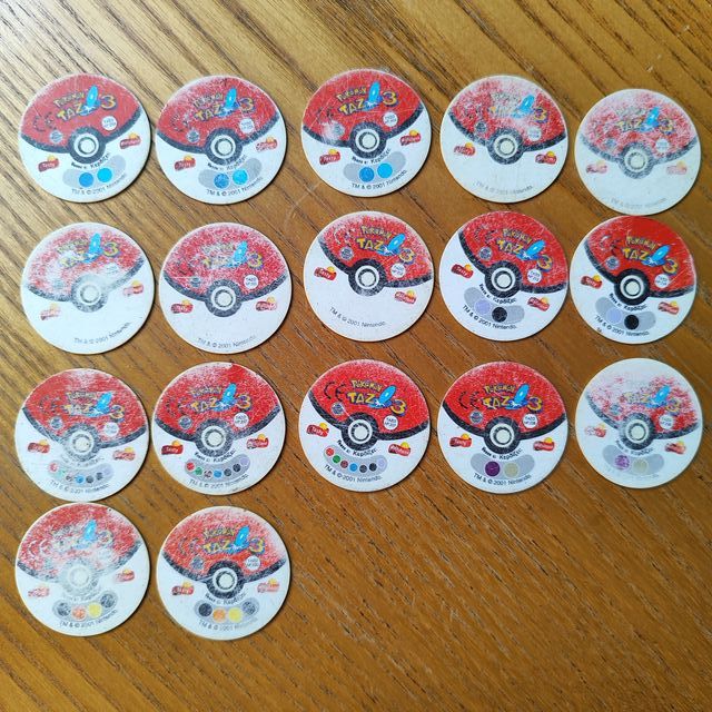 Mix 64 tazos Pokémon + Portatazos Beyblade