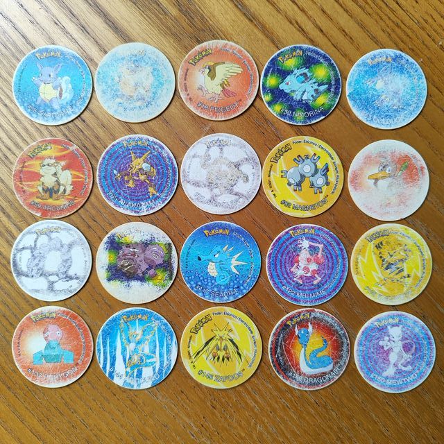 Mix 64 tazos Pokémon + Portatazos Beyblade