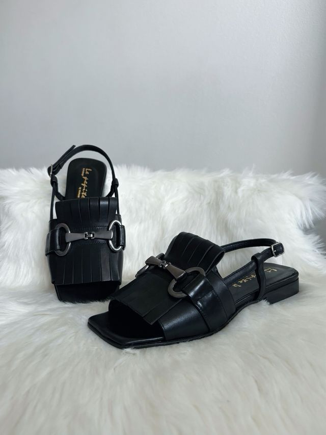 Sandali con morsetto