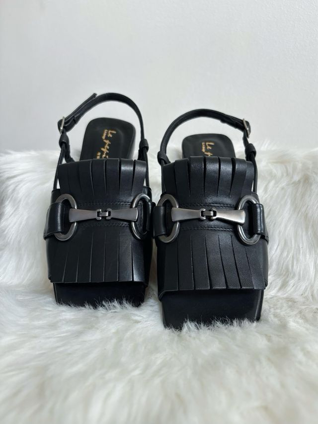 Sandali con morsetto