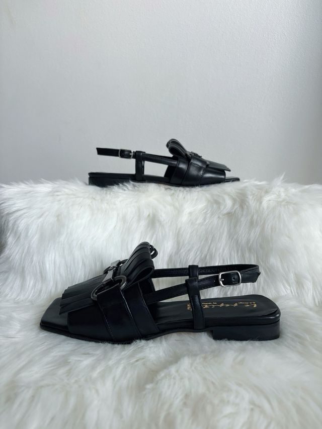 Sandali con morsetto