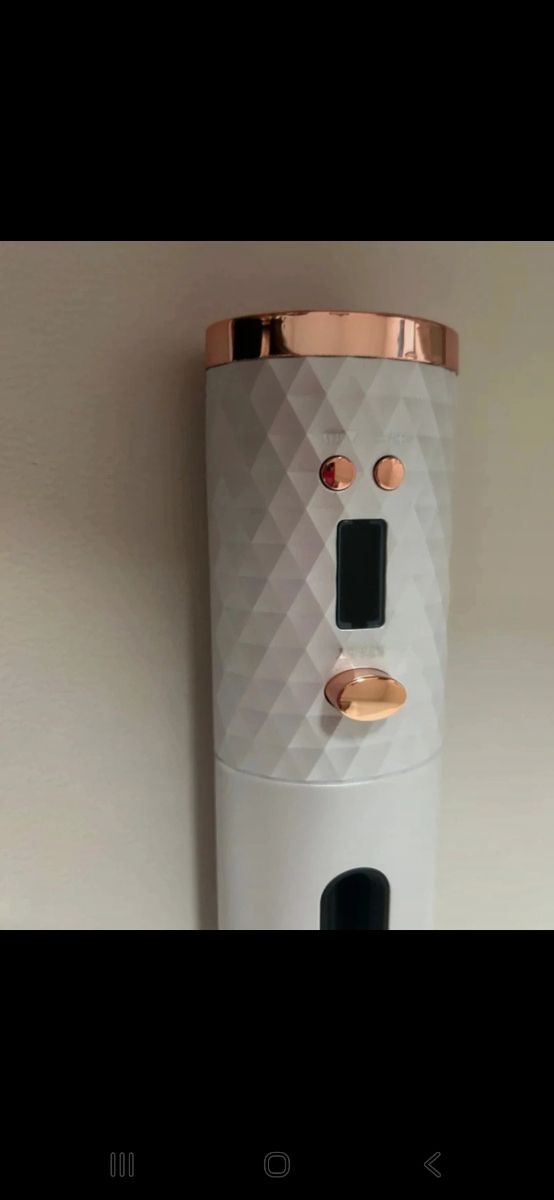 Rizador automático blanco y dorado