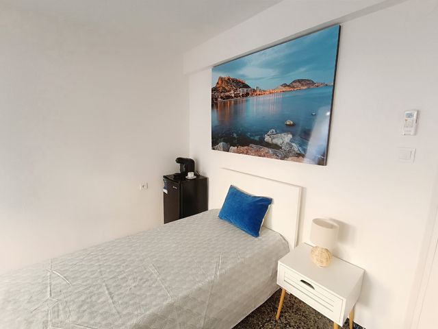 Alquiler habitacion premium con aire acondicionado